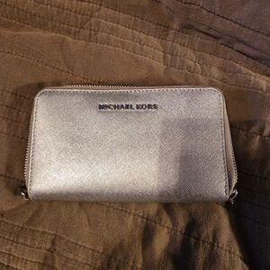 Silver Michael Kors clutch wallet